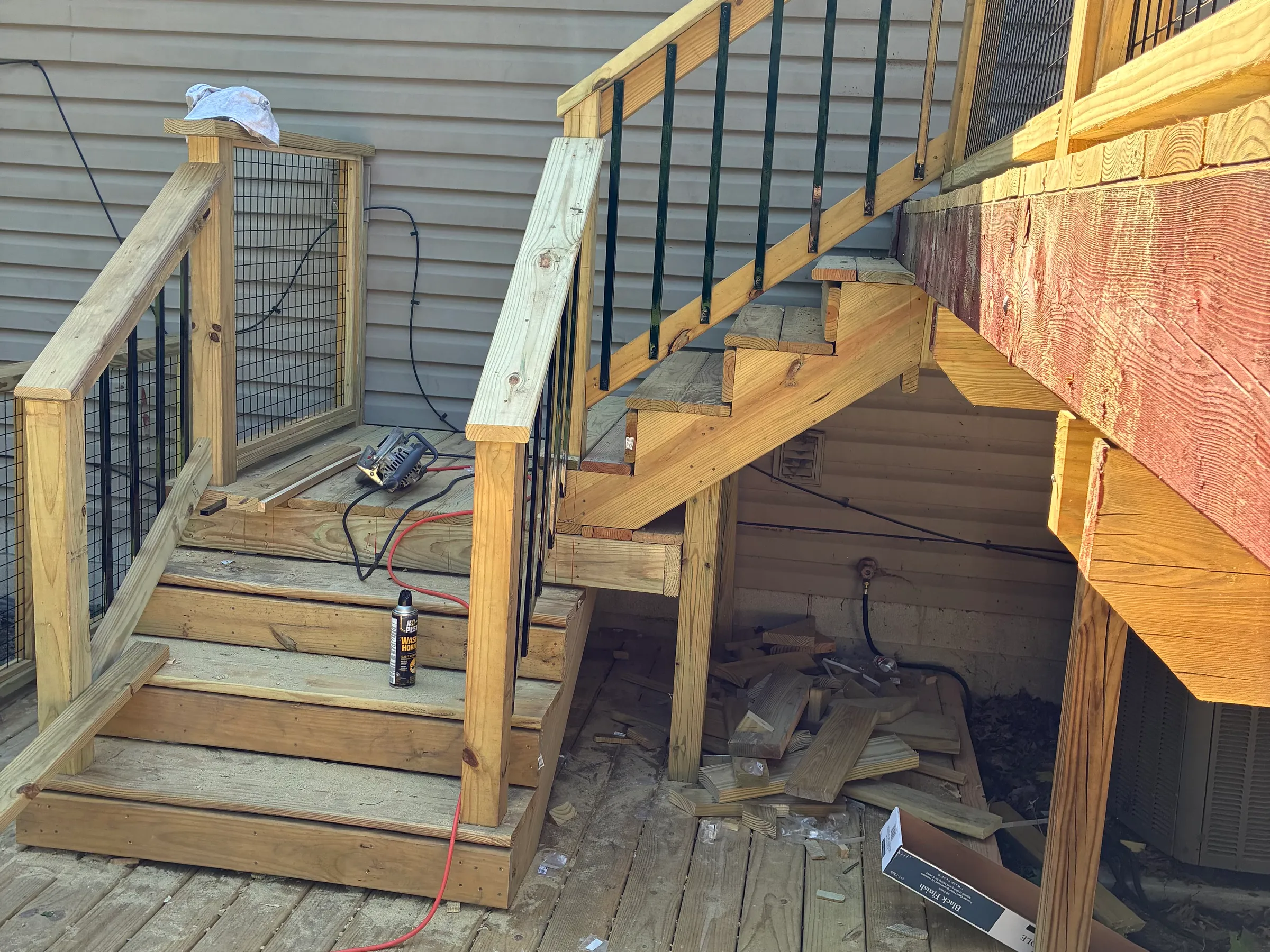 Complete interior view showing comprehensive water damage restoration including wall reconstruction, ceiling repair, flooring restoration, and finished details with proper color and material integration throughout.