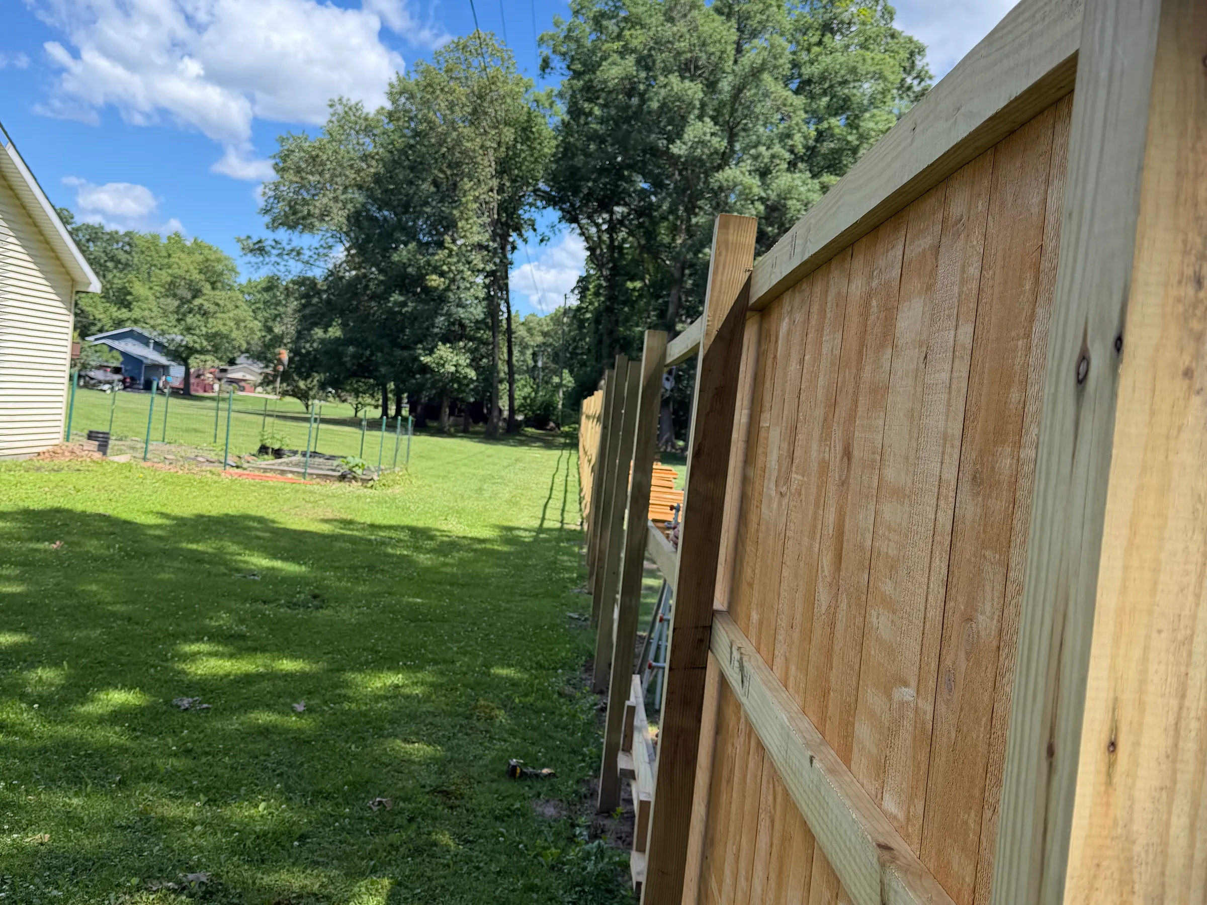 Exterior remodeling work showing new material installation, color-coordinated finishes, integrated accessories, updated architectural features, and professional completion quality throughout visible project scope.